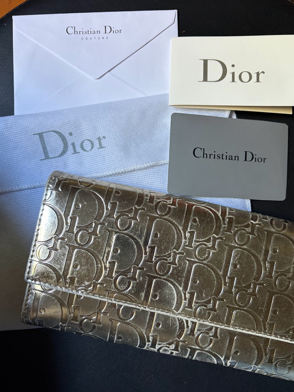 Christian Dior gold embossed trotter wallet (has some callouts)